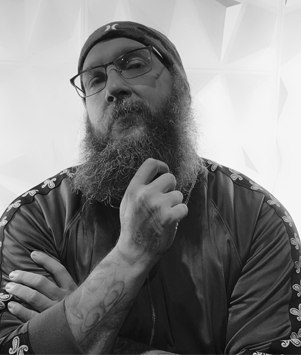 Chris Bucher, Tattoo Artist and owner of Body Mods Ink